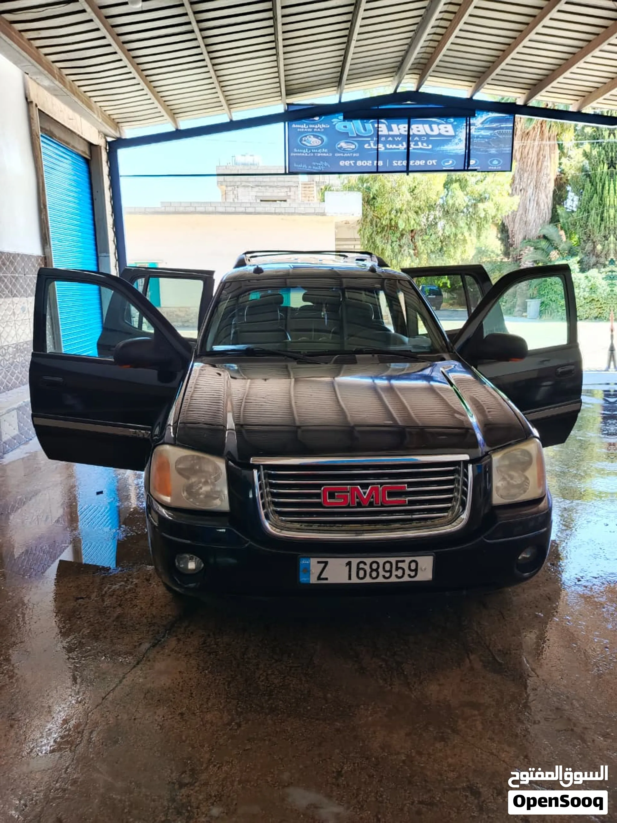 GMC ENVOY XL SLT سبع مقاعد مع تكييف تبريد وتدفئة ومغيرلها زيت للموتبر.