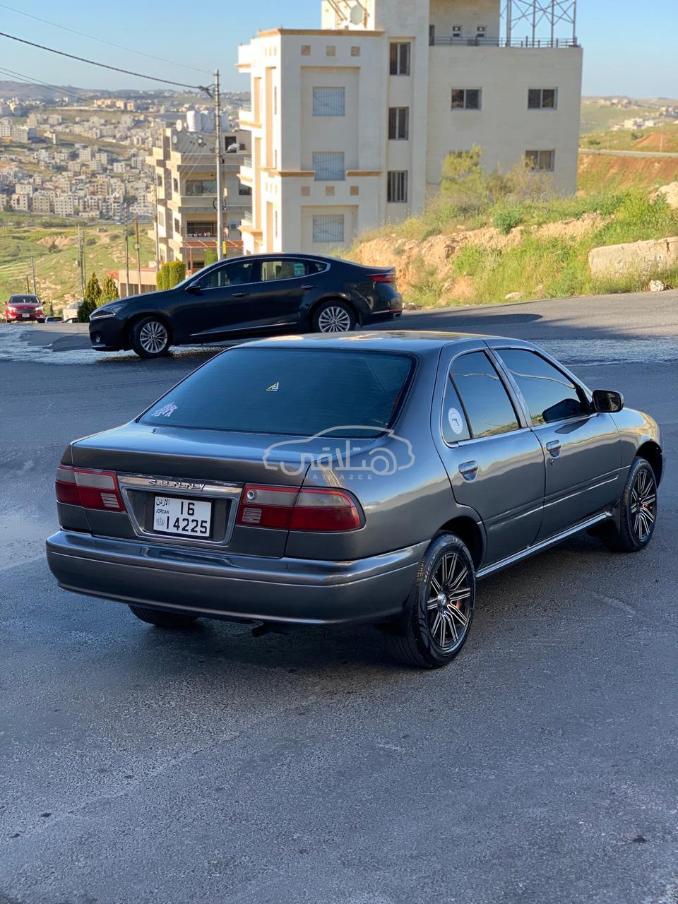 نيسان صنى 2000 للبيع عمان