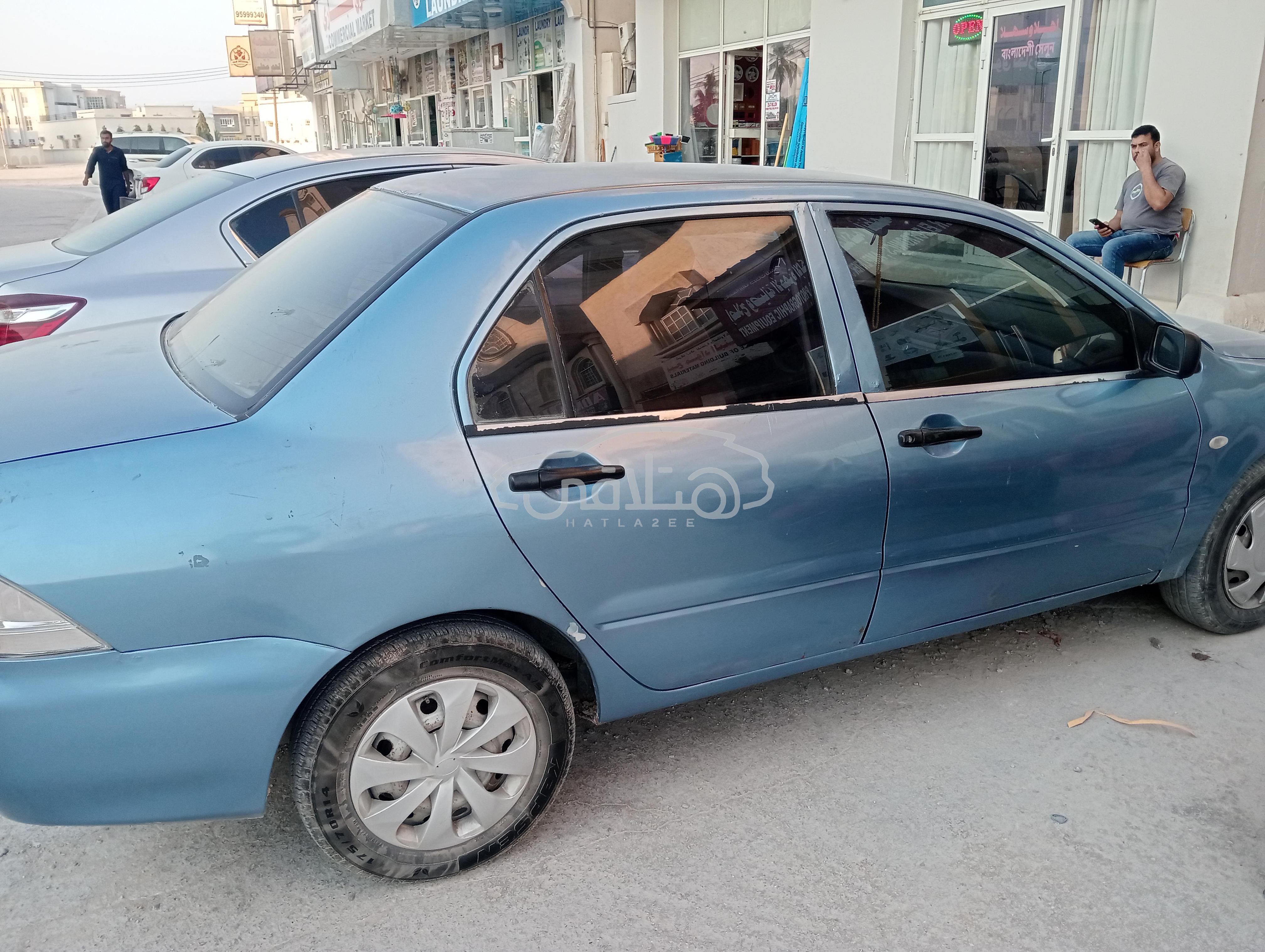 ميتسوبيشي لانسر 2004 للبيع صلالة