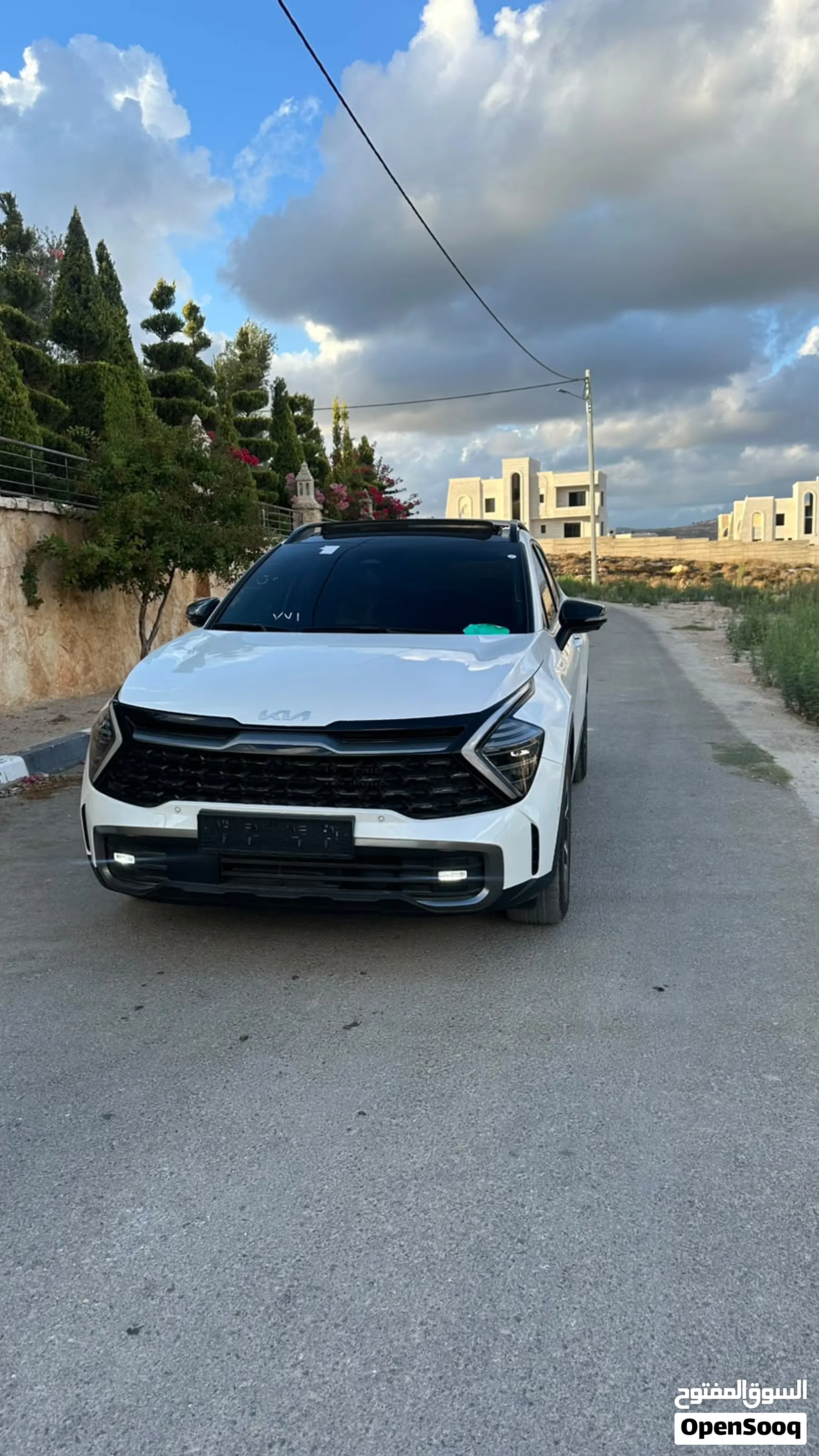 Kia Sportage long black ادشن