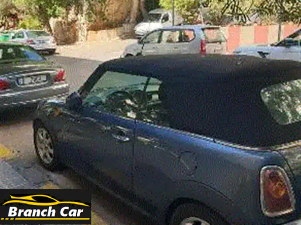 أيقونة الأداء والجمال: MINI Cooper S 2010 الرياضية - سقف بانورامي (لون رمادي)
