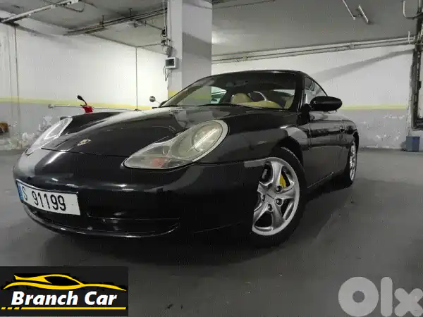 أيقونة Porsche 911 4S موديل 1999 سوداء للبيع - نظافة...