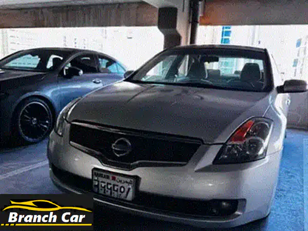 فرصة لا تعوض: نيسان تيدا 2008 للبيع الطارئ - بحالة ممتازة وفحص ساري!