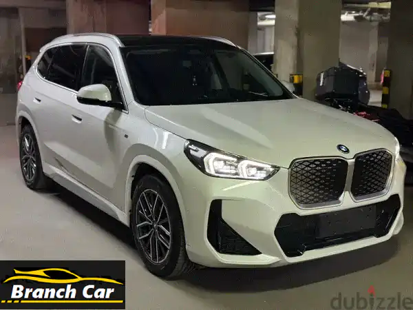 BMW iX12025 M Sport 2025 كهربائية | زيرو لم ترخص | أول مالك |...