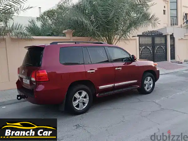 امتلك الأسطورة: تويوتا لاندكروزر GXR 2013 حمراء - وكالة البحرين فل أوبشن | تسجيل وتأمين ساري حتى 2026