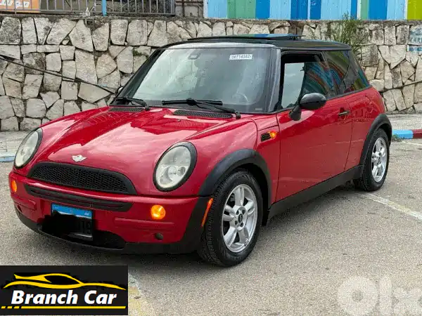 ميني كوبر 2004 حمراء للبيع: أيقونة الأناقة والأداء!...