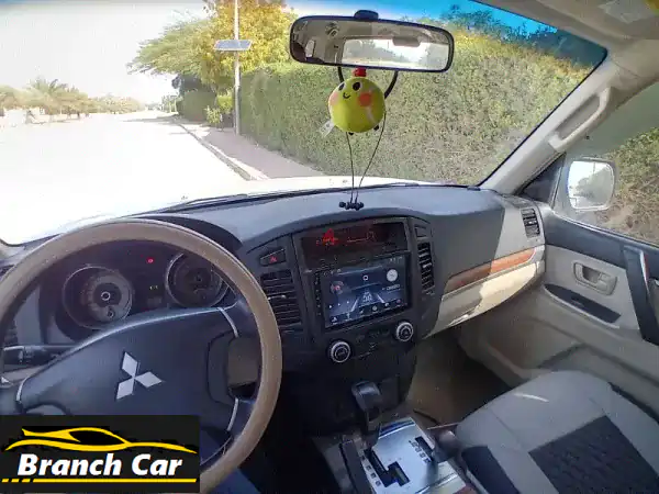 فرصة ذهبية: ميتسوبيشي باجيرو 2009 بيضاء | 7 مقاعد | صيانة شاملة | BHD1900 نهائي