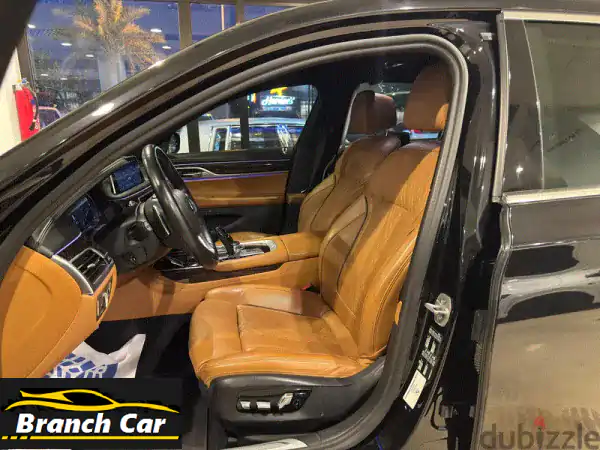 امتلك الفخامة والرفاهية: BMW 730i 2022 | عداد قليل | حالة الوكالة | لا تفوت الفرصة!