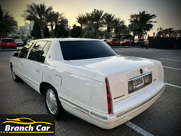 كاديلاك ديفيل 1999 الأيقونية: أبيض لؤلؤي، داخلي أحمر بورغندي | بحالة الوكالة وممشى 110 ألف كم!