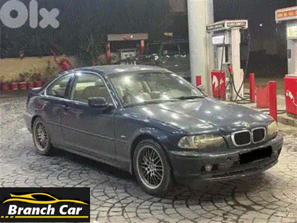 BMW 325i كشف 2001 الأيقونية: رفاهية Harman Kardon، تكييف ثلج، وملاحة - جاهزة للمغامرة!