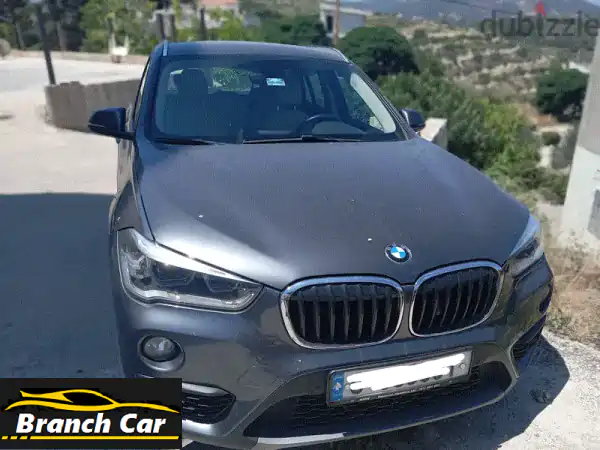 BMW X1 2016 | دفع رباعي فاخر | فحص نظيف وخالي من الحوادث -...
