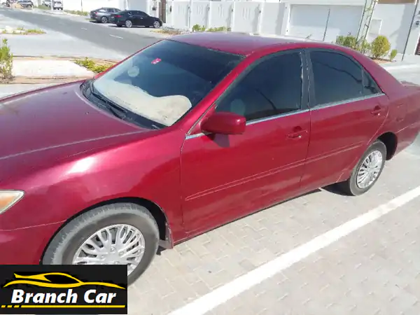 تويوتا كامري 2004 للبيع: نظيفة جداً، لون عنابي مميز | ملكية سنة