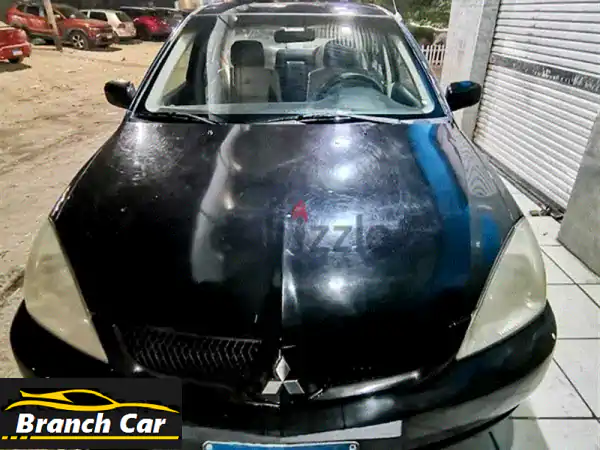 امتلك الأسطورة: ميتسوبيشي لانسر بومة 2006 أوتوماتيك...