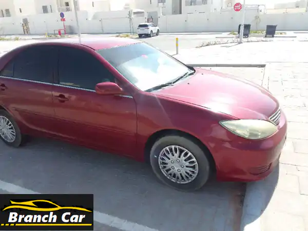 تويوتا كامري 2004 للبيع: نظيفة جداً، لون عنابي مميز...