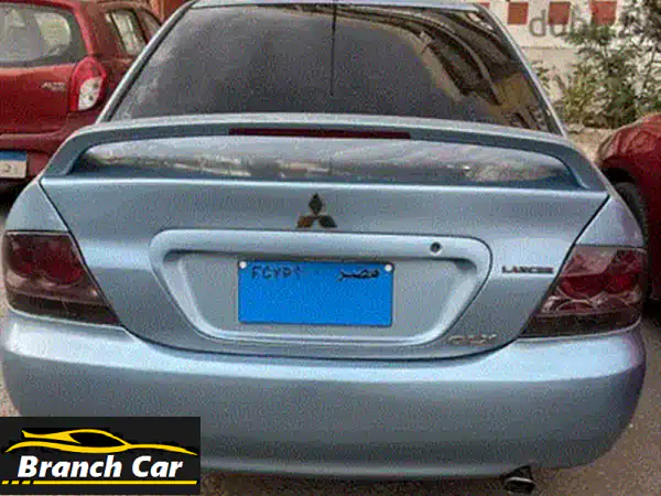 فرصة ذهبية: ميتسوبيشي لانسر بومة 2005 سوبر أكشن 🔥 فبريكا دواخل وسقف | فتحة سقف وABS - الشيخ زايد