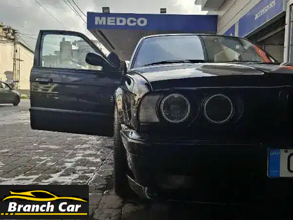 امتلك أسطورة: BMW الفئة الخامسة 1991 - أداء مثالي وصوت...