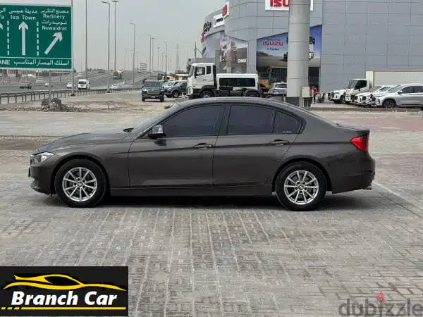 BMW 316i 2015 بني | أناقة وفخامة بسعر 3400 د.ب قابل للتفاوض | مواصفات مميزة!