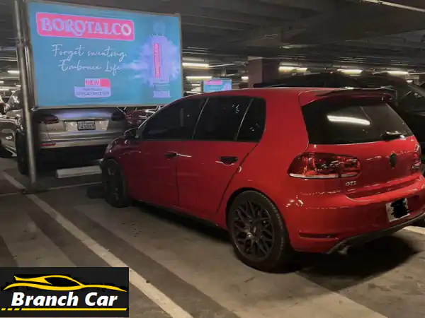 فرصة سفر لا تتكرر! فولكسفاجن جولف GTI 2010 حمراء - أسطورة الأداء الرياضي تنتظرك بالكويت بسعر مغرٍ