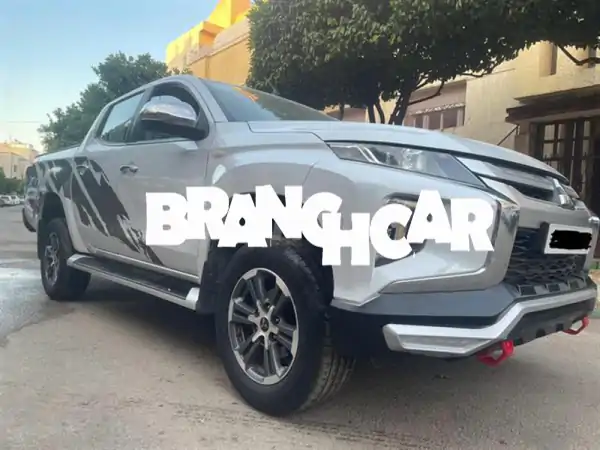 ميتسوبيشي L200 دبل كابينة 2021 للبيع - حالة ممتازة، طلاء أصلي، جاهزة للعمل والمغامرة!